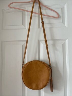 Antik Kraft Round Crossbody Bag in Tan with Tassel
